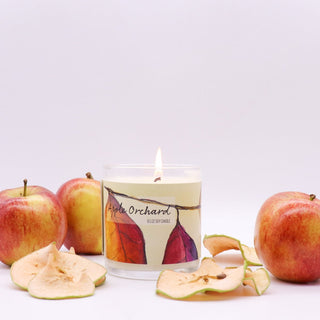 lit apple orchard candle roots and wings